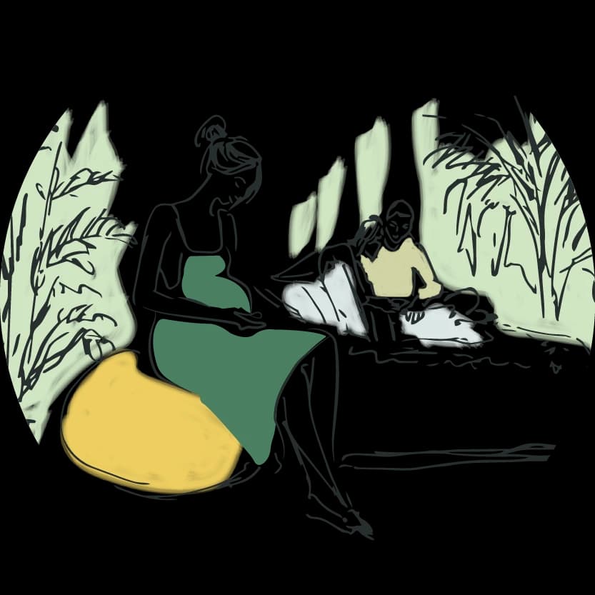 A pregnant woman relaxing at home